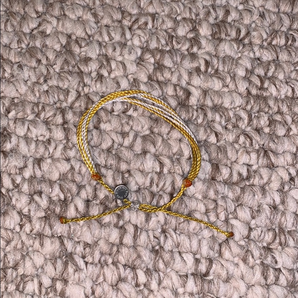 yellow and white pura vida braclet